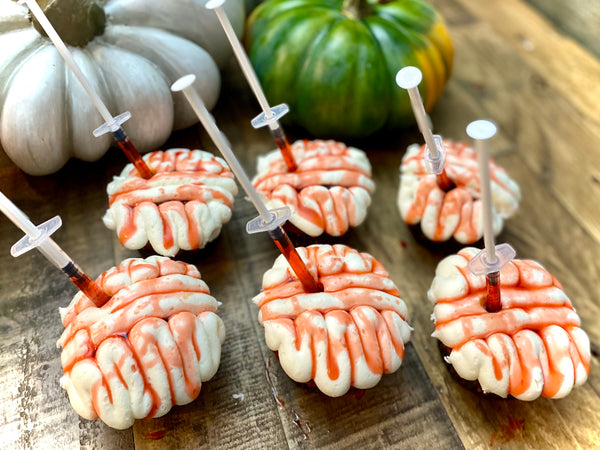 Brain cupcakes with syringe